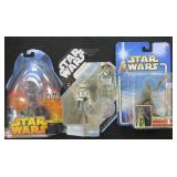 Three (3) 2002,2005,2007 Star Wars Figures