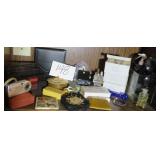 Contents of Shelf with Pulls and Camera