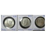 Three (3) Kennedy Half Dollars