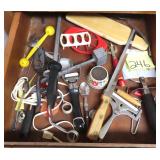 Contents of Kitchen Drawer with Pizza Cutter