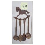 Iron Utensils look old while horse does not