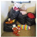 Five Garbage Bags with Pillows and Animals