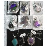 Eight (8) German Silver Pendants and Chains