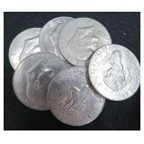 Random Pull of Six (6) Clad IKE Dollars