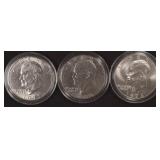 Three (3) IKE Dollars