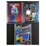 Three (3) Serial #d Football Relic Cards incl.