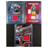 Three (3) Serial #d Football Relic Cards incl.