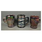 Three Dugan Carnival Glass Mugs