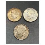 1964 Kennedy Silver Half Dollar And Two 1965's