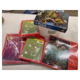 PLASTIC BIN WITH ASSORTED PUZZLES, DREAMCATCHER