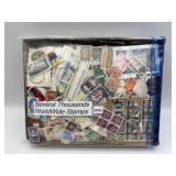 BOX WITH SEVERAL THOUSAND WORLD WIDE STAMPS