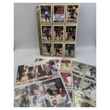 4 COMPLETE MINT HOCKEY SETS IN PAGES