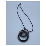 ESTATE MULTI RING PENDANT ON NEW CORD