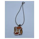 ESTATE TRIBAL TOUCHING PENDANT ON NEW CORD