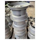 (4) LIGHT GREY RIMS 12 X 7.5 - 4 BOLT