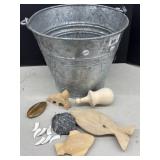 galvanized water pail and in complete carvings