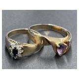 2 Rings - Dark Stone surrounded by Clear Stones