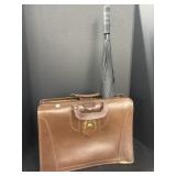 cow hide brief case and umbrella