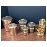 copper canisters and candle holder