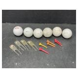 6 Used Golf Balls and Tees