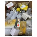 Large Box Of Used And New Lightbulbs