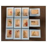 12 Various Brooches in Individual Boxes