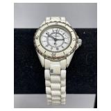 Lady's Wristwatch:  Chanel with a Quartz Movement.
