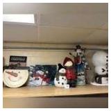 Lot of Christmas decor including wooden clock, canvas wall hanging, statues