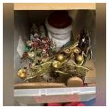 Tub of Christmas decor including candle holders, cookie jar, angels, figurines