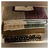 Lot of placemats and storage tub