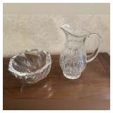 Signed crystal 8” bowl (has several chips), crystal pitcher