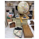 Globe, card box, calculator, playing cards, stapler