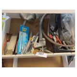Oil cans, ruler, knife, caulking gun, misc