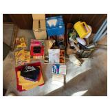 Folding chair, flashlights, screwdrivers, scissors, mousetraps, several cans Gorilla waterproof patch, night lights, misc