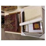 Picture frames, easels, photo albums