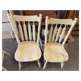 2 white dining chairs