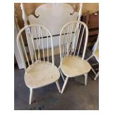 2 white spindle back chairs