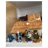 Dept 56 Christmas village with town people (3rd shelf)