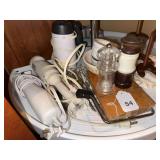 Hand mixer, electric knife, emulsifier, cheese, salt and pepper, heated bread stone, misc