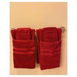 Contents of hall bathroom, towels, suitcases, tablecloths, baskets, contents of vanity