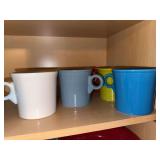 7 Fiesta mugs, 4 Fiesta glass tumblers and 3 juice glasses
