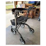 Folding walker/seat with hand brakes