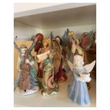 Christmas angels, Fontanini, Fostoria bell, miscellaneous (top shelf)
