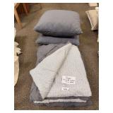 Queen reversible comforter, two euro pillows