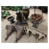 Glass pedestal bowl in metal stand, wall shelves, pair of metal candle holders, large vase with lid, metal pedestal bowl