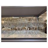 Lot of clear glassware stemware, candleholders
