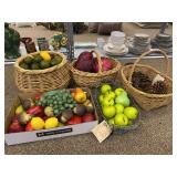 Wicker and metal baskets, pine cones, faux fruit and vegetables