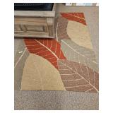 USED 5X8 AREA RUG