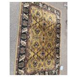 Thomasville 5 x 8 rug black, gold and red