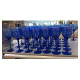 Blue glass stemware, Tienshan stoneware, pink glassware